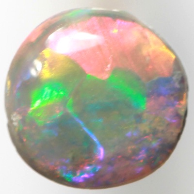 SOLID SEMI BLACK OPAL Bright red and green rolling flashes